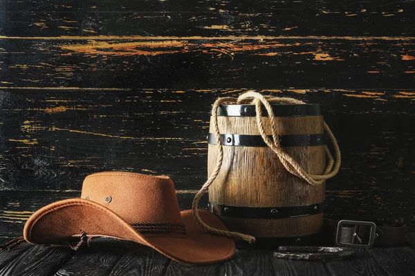 stock image Cowboy hat, lasso and horseshoe on wooden background