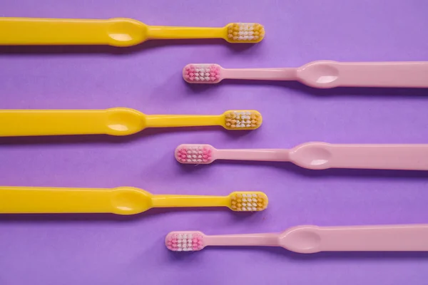 Plastic Toothbrushes Lilac Background — Stock Photo, Image