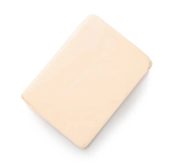 白い背景に隔離された加工チーズ — ストック写真