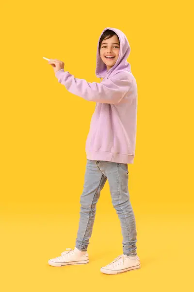Little Boy Chalk Piece Yellow Background Children Day Celebration — Stock Photo, Image
