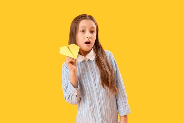 Little Girl Paper Plane Yellow Background Children Day Celebration — Stock Photo, Image