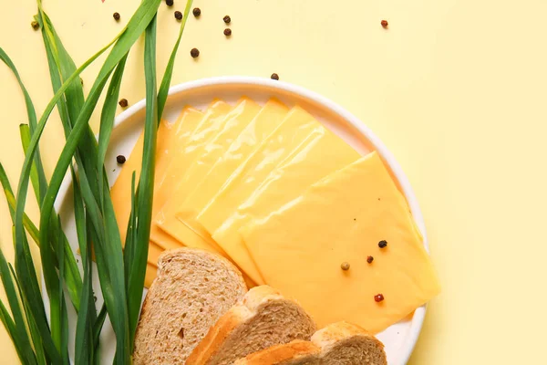 Plate Tasty Processed Cheese Bread Scallions Orange Background — Stock Photo, Image