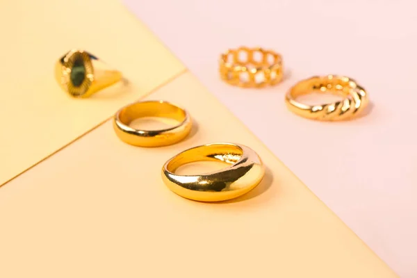 Different Beautiful Golden Rings Color Background — Stock Photo, Image
