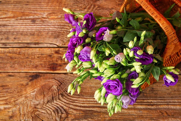 Basket Eustoma Flowers Wooden Background — Stock Photo, Image
