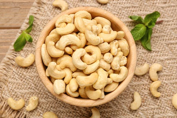 Bowl Tasty Cashew Nuts Wooden Background — Stock Photo, Image