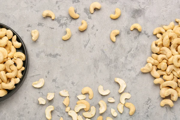 Grunge arka planında lezzetli kaju fıstığı