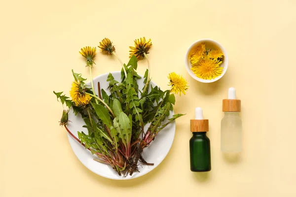 Bottles Cosmetic Oil Plate Dandelion Flowers Beige Background — Stock Photo, Image