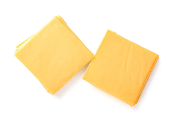 白色背景的一堆堆加工好的奶酪 — 图库照片