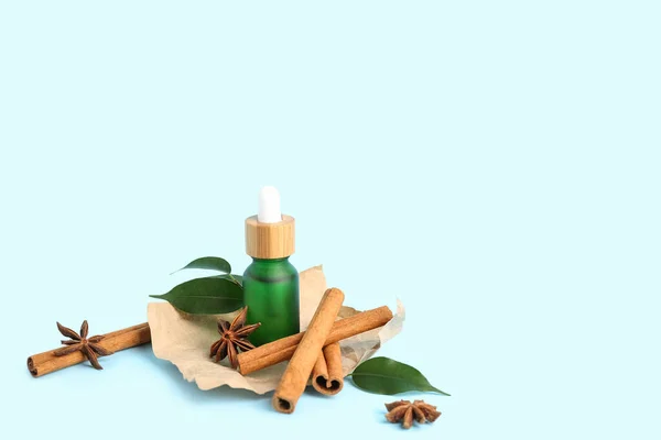 Bottle Essential Oil Cinnamon Sticks Anise Stars Plant Leaves Color — Stock Photo, Image