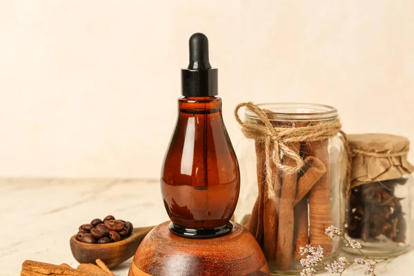 Bottle Essential Oil Cinnamon Sticks Anise Stars Coffee Beans Light — Stock Photo, Image