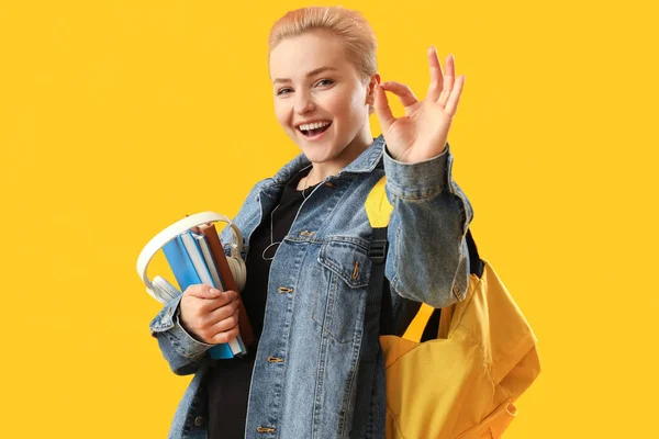 Female Student Books Headphones Showing Yellow Background — Stock Photo, Image