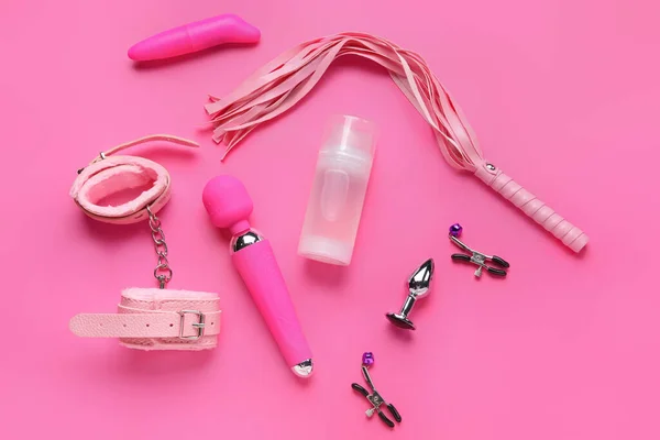 Flaska Med Smörjmedel Och Sex Leksaker Rosa Bakgrund — Stockfoto
