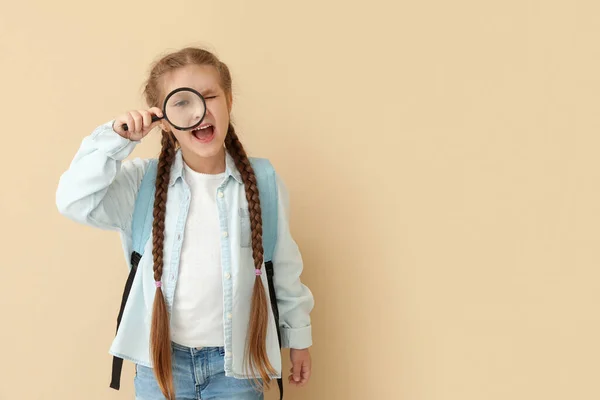 Little Girl Magnifier Beige Background Children Day Celebration — Stock Photo, Image