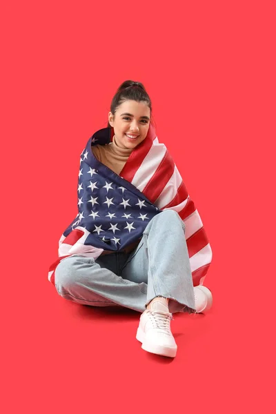 Young Woman Usa Flag Sitting Red Background — Stock Photo, Image