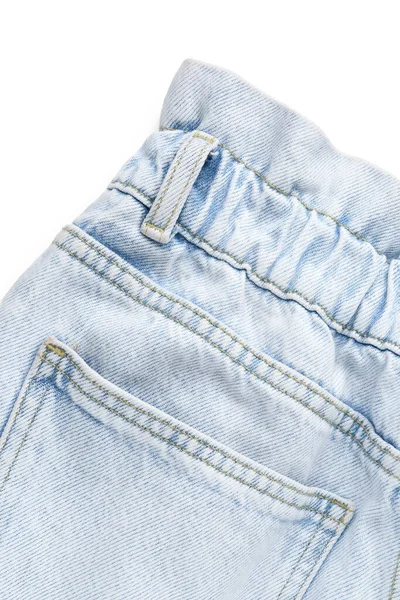白色背景的时尚蓝色斜纹棉布牛仔裤 — 图库照片