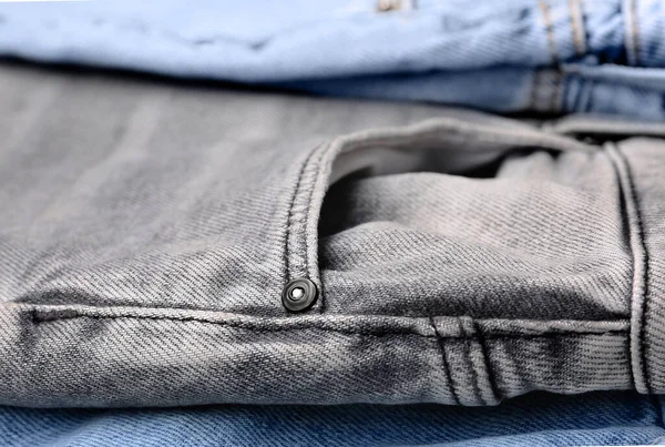 Diversi Jeans Denim Alla Moda Come Sfondo Primo Piano — Foto Stock