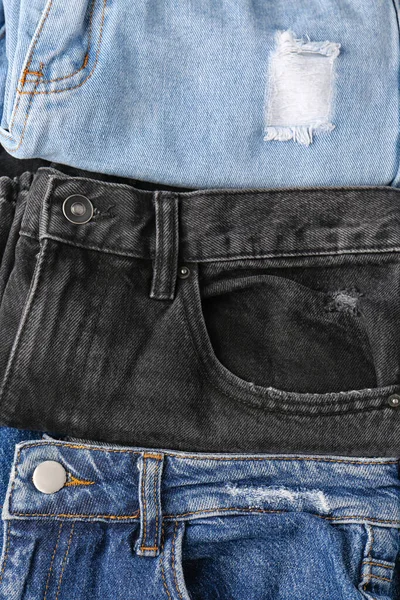Jeans Dobrado Diferente Como Fundo Close — Fotografia de Stock