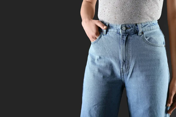 Young Woman Stylish Jeans Dark Background Closeup — Stock Photo, Image