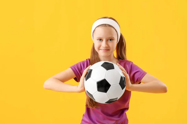 Sporty Little Girl Soccer Ball Yellow Background — Stock Photo, Image