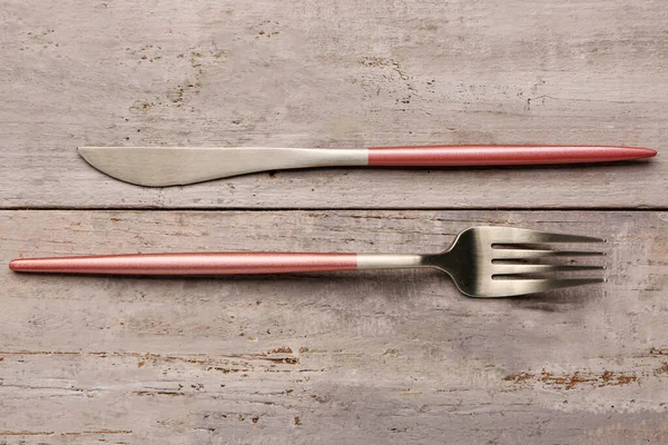 Stainless Steel Fork Knife Pink Handles Grey Wooden Background — Stock Photo, Image