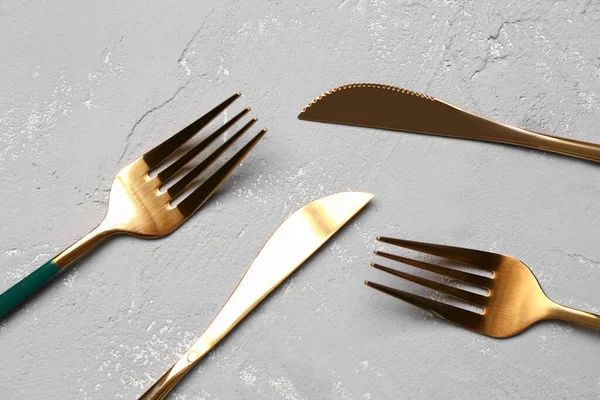 Golden Forks Knives Green Handles Grey Background — Stock Photo, Image