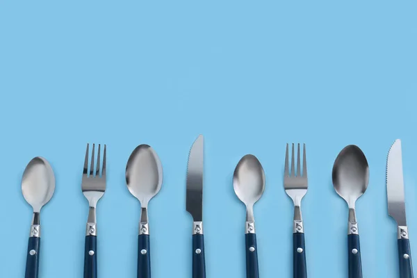 Stainless Steel Cutlery Blue Background — Stock Photo, Image