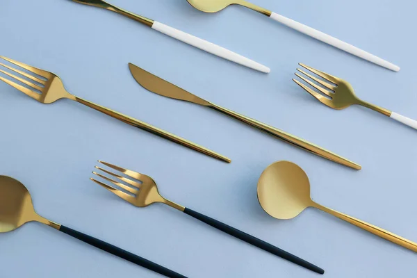 Golden Cutlery Blue Background — Stock Photo, Image