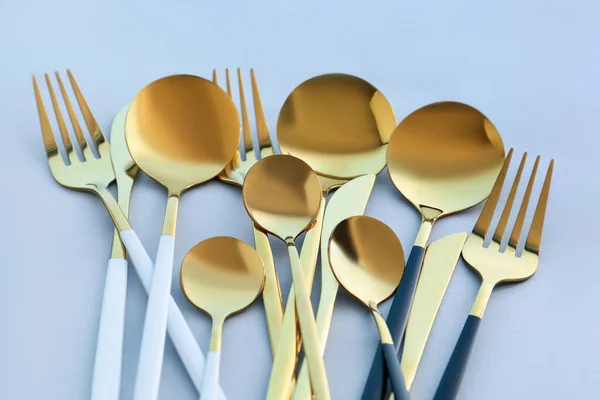 Golden Cutlery Blue Background — Stock Photo, Image