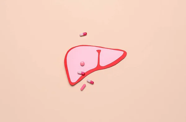 Pink Paper Liver Pills Beige Background — Stock Photo, Image