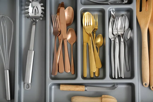 stock image Open kitchen drawer with different cutlery