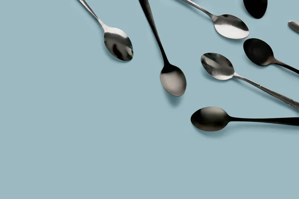 Stainless Steel Spoons Blue Background — Stock Photo, Image