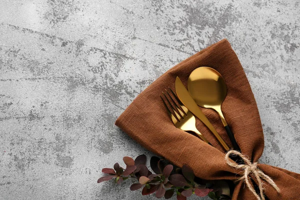 Golden Cutlery Barberry Twig Napkin Grey Grunge Background — Stock Photo, Image