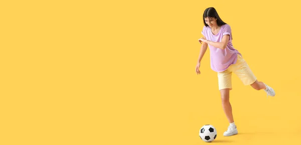 Young Woman Playing Soccer Ball Yellow Background Space Text — Stock Photo, Image