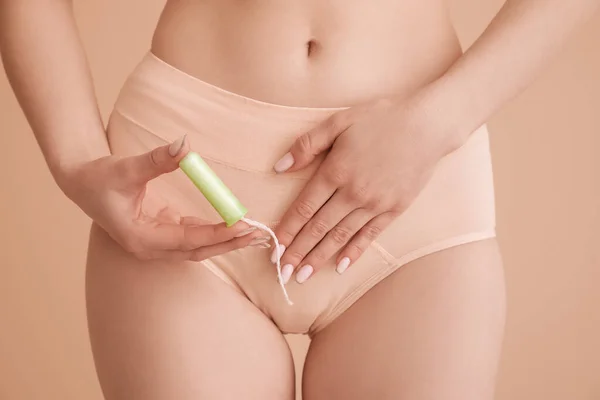 Young Woman Menstrual Panties Tampon Beige Background Closeup — Stock Photo, Image