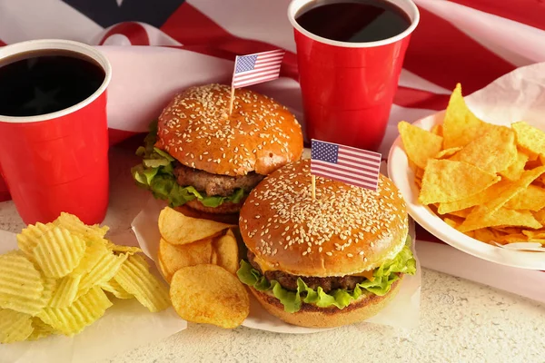 Tasty Burgers Potato Chips Nachos Cups Drink American Flag Light — Stock Photo, Image