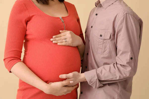 Young Pregnant Couple Beige Background Closeup — Stock Photo, Image