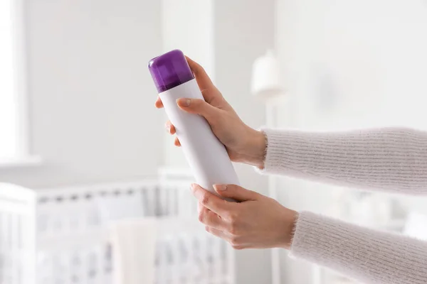 stock image Woman with air freshener in bedroom, closeup