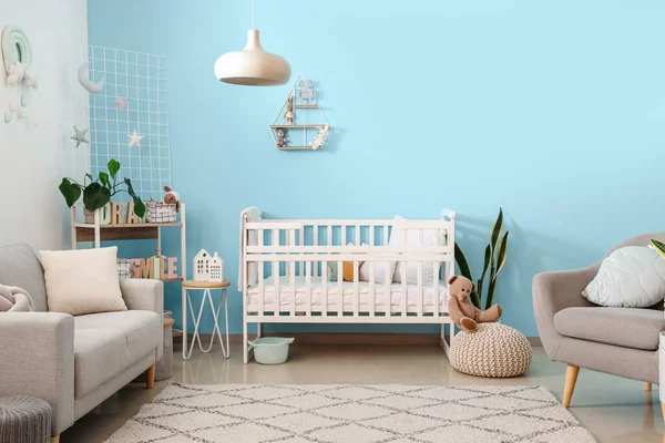 Interior Stylish Bedroom Baby Crib Sofa Shelving Unit — Stock Photo, Image