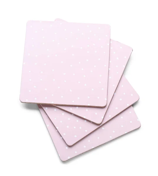 Pink drink coasters isolated on white background