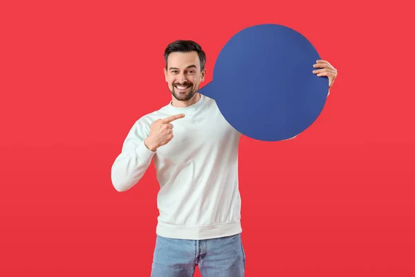Handsome Man Pointing Blank Speech Bubble Red Background — Stock Photo, Image