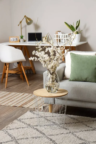 Interior Living Room Grey Sofa Blossoming Tree Branches Coffee Table — Stock Photo, Image