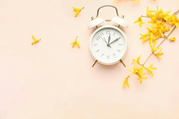 Blooming Tree Branches Yellow Flowers Alarm Clock Beige Background — Stock Photo, Image