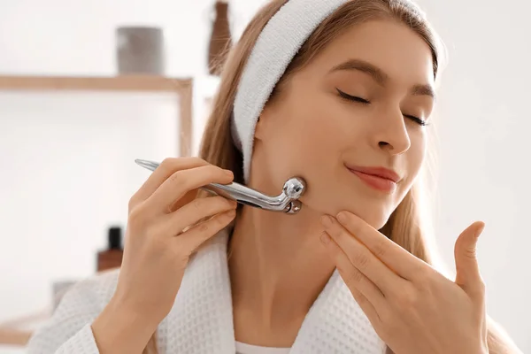 Young Woman Facial Massage Tool Bathroom Closeup — Stock Photo, Image