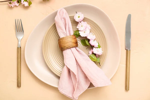 Beautiful Table Serving Cutlery Blooming Tree Branch Folded Napkin Beige — Stock Photo, Image