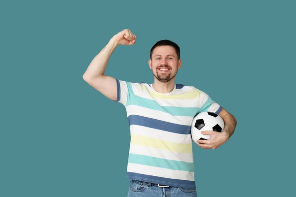 Hombre Feliz Con Pelota Fútbol Sobre Fondo Azul —  Fotos de Stock