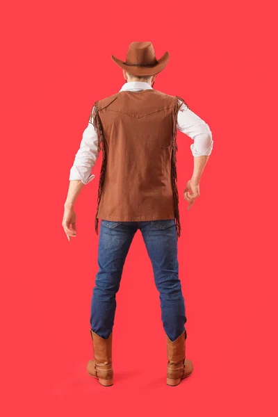 Handsome Cowboy Red Background Back View — Stock Photo, Image