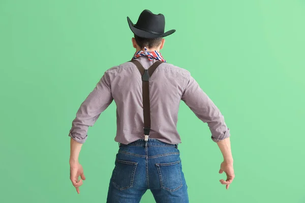 Handsome Cowboy Green Background Back View — Stock Photo, Image
