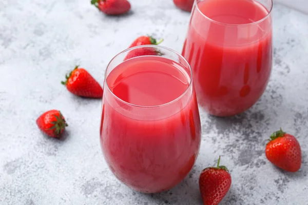 Glasses Tasty Strawberry Juice Grey Table — Stock Photo, Image