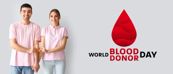 Baner Światowy Dzień Dawcy Krwi Młodą Parą — Zdjęcie stockowe