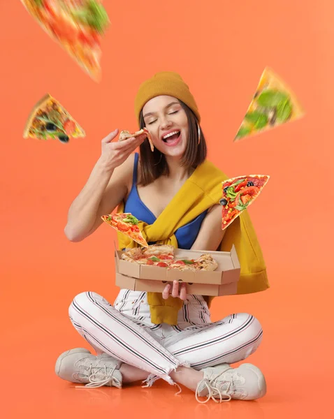 Pretty Young Woman Eating Tasty Pizza Orange Background — Stock Photo, Image